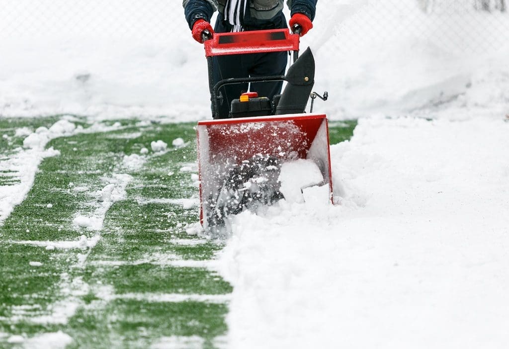 cleaning snow on grass