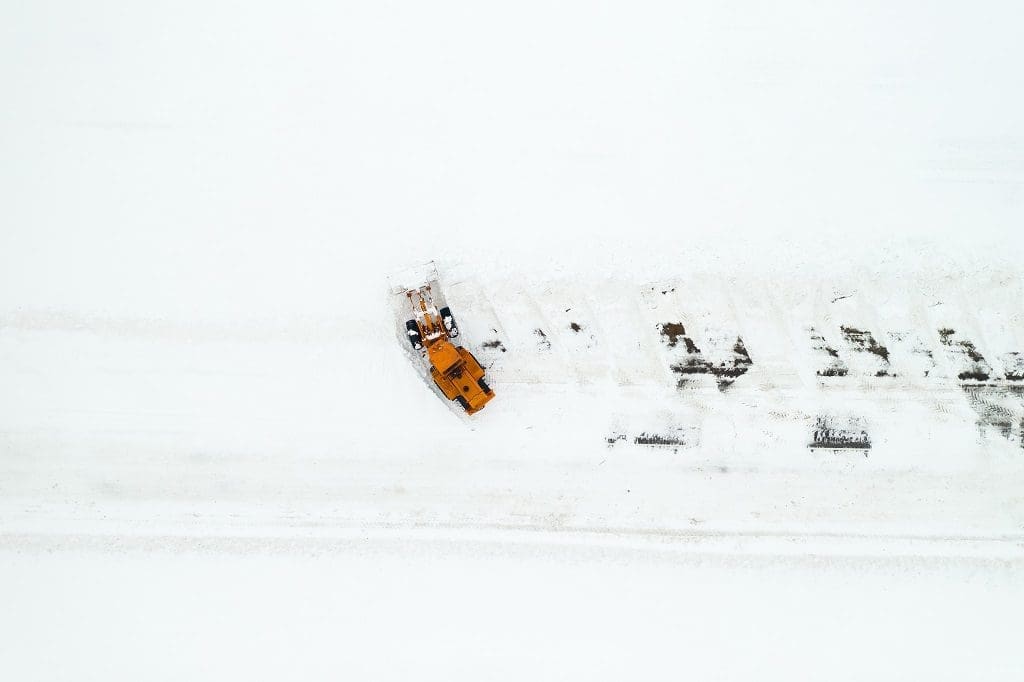 clearing the road from snow.